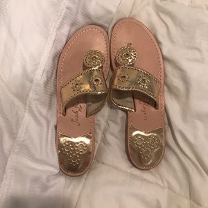 Jack Rogers gold sandals.